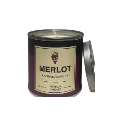 Front view of Merlot candle in a metal tin with a purple and black label