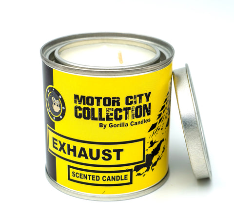 Front view of exhaust candle in a metal tin with a yellow label
