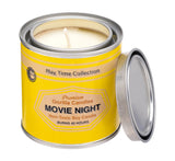 Movie Night candle in a tin with a yellow label around it.
