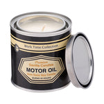 Front view of Motor Oil Candle in a tin container with black label