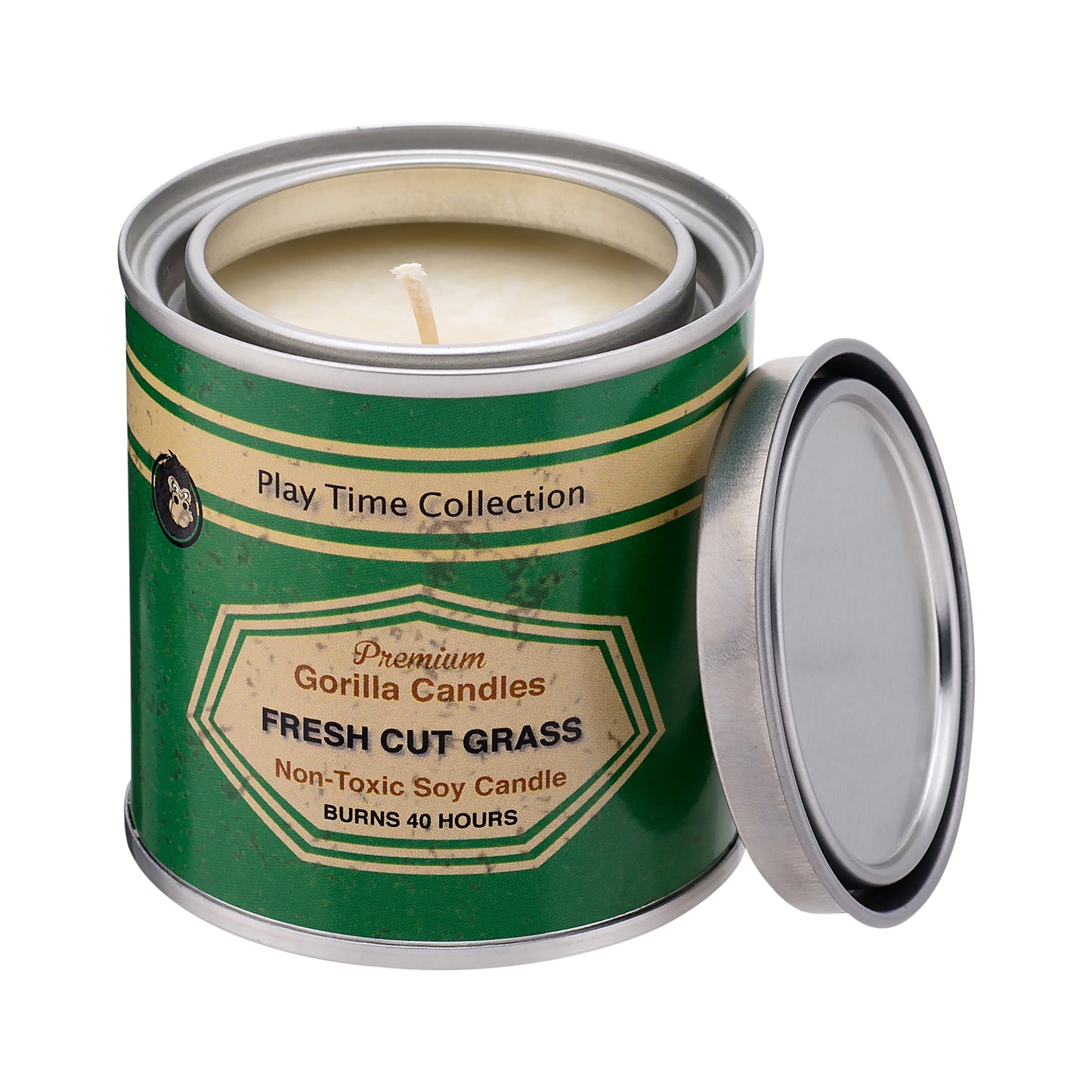 Front view of opened Fresh Cut Grass candle tin with green label